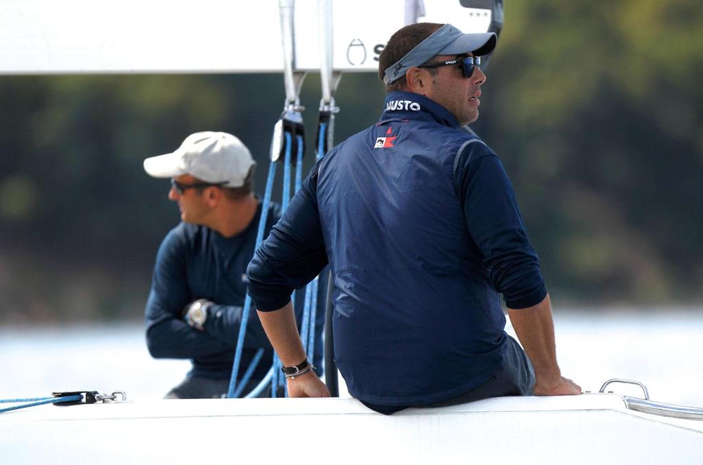 Stratis Andreadis (Right) of Atalanti Racing looks on after being black flagged in a match against  Mark Lees, of Team Echo Sail Racing, in the Oakcliff International on the second day of competition, in Cold Spring Harbor near Oyster Bay, NY on September 6, 2013. © 2013 Molly Riley/Oakcliff